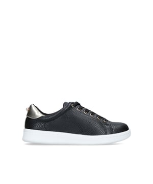 Go for a contemporary look on your days off with the Kori trainer by Miss KG. The best-selling trainer is now available in black with mock croc detailing on the upper and contrasting white sole. This style is made for all-day comfort and finished with gold hardware and a metallic heel.
