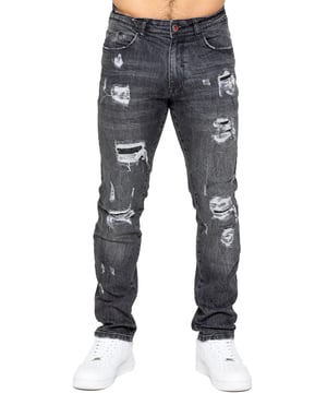 Upgrade your denim collection with Enzo Men's Distressed Ripped Jeans. Designed for the modern man, these jeans combine style and comfort with a classic straight leg cut and versatile 5-pocket design. The stretch fabric ensures a perfect fit and ease of movement. Featuring a zip fly fastening, distressed rip & repair detailing, and a branded back patch, these jeans add a rugged touch to any outfit. Ideal for casual outings or nights out, they effortlessly blend style and functionality.