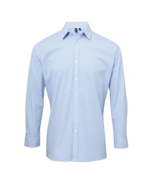 100% Baumwolle. Stoff: Gingham, Popeline. Muster: Mikrokariert. Manschette: Doppelter Knopf. Ärmel-Typ: Langärmelig. Saum: Gerade. Ausschnitt: Umlegekragen. Rückenabnäher, Rückenpasse, klare Knöpfe. Passform: Tailliert. Nachhaltigkeit: Amfori, BSCI, REACH, Sedex, WRAP zertifiziert.