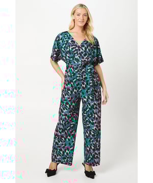 Striking abstract print jumpsuit from the Coast x Debut London collection
        Flattering V-neckline and wide-leg silhouette
        Elegant flutter sleeves for a feminine touch
        Cinched waist with self-tie belt for a defined silhouette
        Versatile crepe fabric suitable for various occasions
    
    Make a statement at your next event with this eye-catching wide-leg jumpsuit from Coast's collaboration with Debut London. The bold abstract print commands attention, while the flattering V-neckline and cinched waist create a sophisticated silhouette. Perfect for weddings, races, or formal gatherings, this jumpsuit offers both style and comfort. Pair with strappy heels and statement earrings for a polished look, or dress it down with a cropped jacket and block heels for a more casual affair. The versatile crepe fabric ensures you'll feel confident and comfortable throughout the day. Whether you're attending a summer garden party or an evening soire, this jumpsuit is sure to turn heads and keep you looking effortlessly chic.