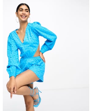 Jumpsuits & Playsuits by Pretty Lavish No need for a dress to impress V-neck Open, tie back Blouson sleeves Regular fitSold By: Asos
