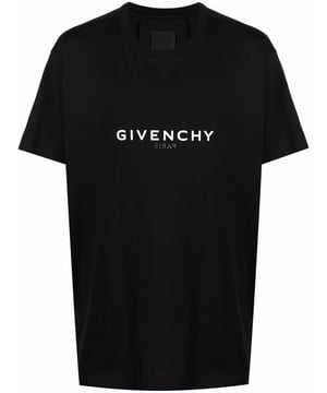Givenchy reinterprets their signature name for SS22, intertwined with their creative aesthetic. As seen with this T-shirt, subtle branding is printed on both sides in contrasting shades, mirroring the house's transition between old and new.