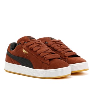 Sneakers featuring a premium suede upper for a sleek and stylish look. Debossed and foil-printed PUMA branding on the quarter panel adds a touch of sophistication. Finished with a durable rubber sole for reliable traction and comfort.
