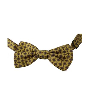 Pajarita 100% autentica de Dolce & Gabbana.
  Diseno exclusivo de la coleccion Dolce & Gabbana.
  Color: Amarillo con estampado.
  Modelo: Atado.
  Material: 100% seda.
  Correa para el cuello de longitud ajustable talla unica.
  Fabricado en Italia.
  Etique.