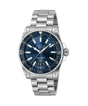 Product Specifications 

Brand: Gucci
Model: YA136311
Movement: Swiss made quartz (battery)
Case Size: 40mm
Case Material: Stainless steel

Band Material: Stainless steel
Dial Colour: Blue

Glass: Sapphire crystal
Water Resistance: 200m or 20ATM

Product Descriptions
Elevate your wristwear to new heights with the Gucci Dive Stainless Steel Bracelet Blue Dial Men's Watch â€“ a fusion of impeccable style and Swiss precision. Immerse yourself in the world of luxury with a timepiece that effortlessly marries functionality with fashion, reflecting the timeless allure of Gucci.
Powered by a Swiss-made quartz movement, this watch ensures unrivalled accuracy and reliability. The battery-driven mechanism seamlessly integrates with the renowned Swiss craftsmanship, providing a timepiece that not only keeps precise time but also reflects the commitment to excellence synonymous with Gucci.
The 40mm case, crafted from durable stainless steel, presents a sleek and modern design that exudes sophistication. The meticulous attention to detail in both form and function makes this watch a versatile companion for any occasion, embodying the essence of contemporary luxury.
The stainless steel bracelet not only complements the case seamlessly but also adds a touch of refinement to your wrist. The link bracelet design ensures a comfortable fit while enhancing the overall elegance of this Gucci timepiece.
The striking blue dial serves as a canvas for timekeeping precision and aesthetic brilliance. The simplicity of the design, coupled with the signature Gucci detailing, makes for a dial that is both bold and timeless, embodying the brand's distinctive style.
Protected by scratch-resistant sapphire crystal, the dial remains clear and pristine, offering enduring clarity and protection against daily wear. This premium crystal ensures that your watch maintains its impeccable appearance over time.
With a remarkable water resistance of 200 meters or 20ATM, the Gucci Dive watch is not just a style statement but a reliable companion for underwater adventures. From diving to water sports, this timepiece is designed to withstand the rigors of aquatic activities.