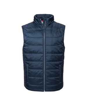 Material: 100% Polyester. Innenfutter: Kontrast. Design: Gesteppt. 66 g/m². Gewebe-Technologie: Aquapel, atmungsaktiv, DuPont Sorona, DWR-Ausrüstung, ökoeffizient, Nanotex, PFC-frei, schauerfest, winddicht. Kinnschutz, Fluorfrei, Innere Sturmklappe. Ärmel-Typ: Ärmellos. Ausschnitt: Stehkragen. Taschen: 2 Seitentaschen, 1 Innentasche, Reißverschluss, eingefasst. Verschluss: Durchgehender Reißverschluss. Saum: Bungee-Schnur. Nachhaltigkeit: Amfori, BSCI, Fair Labor Association, Öko-Tex Standard 100 zertifiziert, WRAP zertifiziert. Hohe Leistung.
