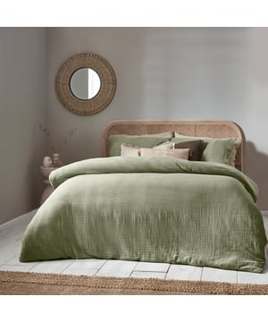 Inspired by timeless classic fabrics, the Lark duvet cover set is made from ultra-soft double-layer muslin cotton fabric. Available in a range of pastel tones, this bedding is complete with a wooden button closure. The cosy crinkle texture is perfect for bringing a relaxed, stylish feel to your bedroom. Cool and breathable in the summer months and snuggly and warm in the winter, muslin is used on both sides for an understated yet modern look. This product is certified by OEKO-TEX®, showing it has been sustainably made.