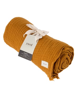 Our Lark throw is perfect for luxury lounging or draping over the bed or sofa for a relaxed and airy look. Crafted from four layers of ultra-soft cotton muslin and finished with an understated frayed edge on two sides, for instant cosiness, comfort and style. This design is available in two sizes, a standard size, and a larger, oversized throw, for even more effortless décor on your soft furnishings.