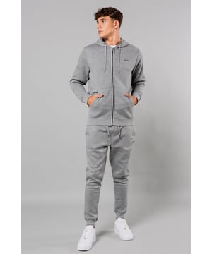 Stay cosy and comfortable in this zip-through hoody and jogger set from Tokyo Laundry. This set features a drawstring waist and a drawcord hood for a perfect, adjustable fit. The kangaroo pocket adds functionality to the stylish design. The fabric is a cotton mix and is machine washable for easy care. This set is a must-have for casual and loungewear.