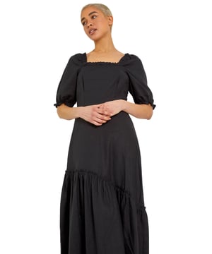 Square Neck Asymmetric Tiered Midi Dress from Roman. We 'Shirr' are excited for this linen blend midi to take a spot in your summer wardrobe! Made to turn heads with its chic tiered skirt and square neckline, our mid-length style has fashionable puff sleeves and is finished with a concealed side zip combined with shirred bodice to keep you comfortable in the warmer weather. Add statement jewellery and heels or swap for military boots to give off an effortlessly stylish vibe for your everyday-wear.