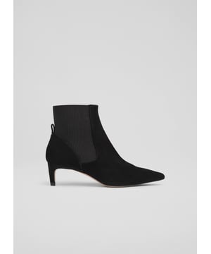 Experience sophistication with the Adya ankle boots, a sleek blend of black suede and pointed stiletto heels that exude elegance. Crafted in Spain with leather lining, these versatile kitten heel boots feature a square toe, with a textured finish and elastic gussets for a comfortable fit. Perfect for both smart and casual ensembles, they pair beautifully with tailored trousers or stylish dresses.