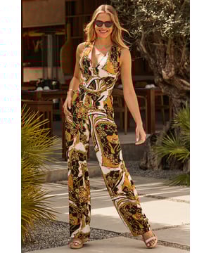 REASONS TO BUY:

Throw on, look amazing
A print you wont find elsewhere
Ultra-flattering wrap front and tapered leg
Soft jersey fabric for comfort and style
Wedges for day, strappy heels for night
Gold accessories are a no brainer