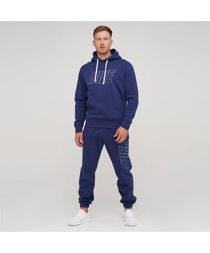 Nike Mens Club Tracksuit Set In Navy.   
Drawstring Hoodie With Pouch Pocket.  
Overhead Design.  
Nike Logo Print and Swoosh Embroidery on the Left Leg.  
Fitted Trims.  
Elasticated Waist Matching Joggers.   
Side Pockets, Fitted Cuffs.