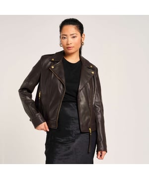 Barneys Originals real leather asymmetric biker jacket in a rich chocolate brown, featuring gold trims that beautifully complement the color. Crafted from soft, luxurious leather for a timeless and elegant finish.