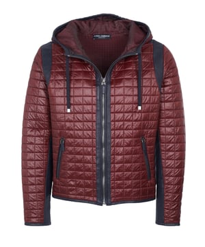 95% Polyamid, 5% Schafleder; Dolce & Gabbana Jacke;  Modell: G9EA5T G7AUZ 79;  Hochwertig verarbeitet;  Kapuze mit Tunnelzug;  Verschluss: Reißverschluss;  Zwei Fronttaschen mit Reißverschlüssen;  Zwei Innentaschen mit Reißverschlüssen