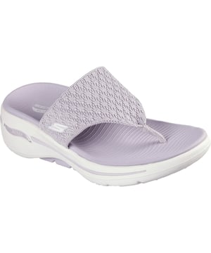 Geniet van ondersteunend casual comfort op warme zonnige dagen met de Skechers GO WALK Arch Fit sandaal. Deze teensandaal heeft een glanzend gebreid bovenwerk met lichtgewicht ULTRA GO demping en een Arch Fit voetbed.