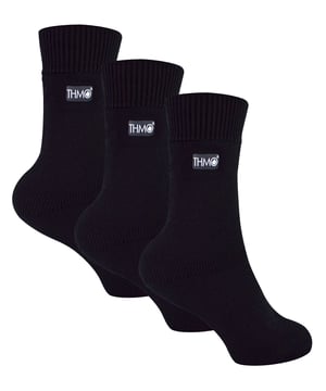 Keeping your little ones warm, comfortable and protected when they're outside is important. That's why we've designed THMO Kids Thermal Socks. The perfect 3 pair value pack to keep your Children’s feet nice and cosy all winter! These socks have a stretchy comfort top that moulds to their leg to reduce constriction rings and tightness, which allows for regular circulation. As well as all day comfort, these socks feature a cushioned foot bed providing feet with an extra layer of support. These socks come in 3 pair value pack so they’ll keep your kids feet warmer for longer and make them great value for money when stocking up your kids sock drawer! They have been double brushed on the inside to maximise warmth by trapping warm air and keeping it close to their feet and legs. The ribbed welt at the top of the sock has been designed to rest to the natural contours of their legs. This wide soft top provides all day comfort and will reduce the chances of nasty constriction rings developing around their legs. These Children’s Thermal Socks come in 4 colour options: Black, Navy, Fuchsia, Purple. They also come in 3 kids size options: 9-12 UK, 12-3 UK and 4-5.5 UK, The THMO badge is also heat transferred onto the side of the socks. These socks come in a 3 pack and are made from 93% Acrylic, 6% Polyamide, 1% Elastane. They’re available in 3 Children’s sizes 9-12 UK(27-30 EUR 10-1 US), 12-3 UK (30-36 EUR, 13-4 US) and 4-5.5 UK(37-38.5 EUR, 5-6.5 US). They are machine washable at 40.