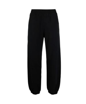 Off-White Diag Tab Slim Black Sweat Pants. Elevate your look with these sleek Off-White sweat pants. The fabric is incredibly comfortable. Enjoy a stylish look perfect for any activity, will keep you comfortable all day long. Make a bold statement that never compromises on quality.. 1 Back Pockets, Off-White Black Pants, 100% Cotton. Elasticated Waist and Cuffed Leg. Diag Logo On Back Legs. Style Code: OMCH029C99FLE001 1010