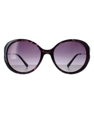 INVU Ronde Vrouwen Donker Tortoise Paars Demi Goud Paars Gepolariseerde B2117 Zonnebril Verhoog je stijl met de INVU Designer Zonnebril model B2117C, ontworpen voor vrouwen die gedurfde elegantie omarmen. Deze prachtige zonnebril heeft een rond montuur van donker tortoise-paars kunststof met slanke metalen pootjes, perfect aangevuld met paarse gepolariseerde glazen met kleurverloop. Het B2117C model combineert vintage allure met moderne functionaliteit en biedt superieure UV-bescherming en de hele dag comfort. Deze eersteklas zonnebril is verkrijgbaar met een ongelofelijke korting op de normale verkoopprijs en is het perfecte accessoire voor elke fashion-forward garderobe. Verwen jezelf met luxe en maak een levendig statement met INVU, terwijl je geniet van uitzonderlijke besparingen.