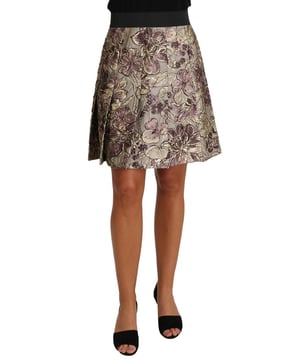 Marca: Dolce & Gabbana  
Estilo: Corte A  
Color: Impresión floral multicolor  
Tela: Jaquard estampado  
Cierre: Cremallera en la parte posterior  
Falda interior: Mezcla de seda rosa con detalles de encaje  
Detalles del logo  
Hecho en Italia  
Material: 59% acetato, 15% poliéster, 10% seda, 9% lurex, 7% nailon