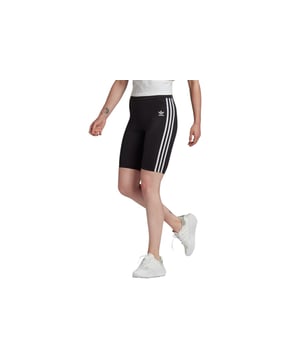 The weekend calls. Rock these high-waisted short tights with a jean jacket and chunky kicks for a look that's effortless and on trend. Made with recycled materials, they're part of adidas' efforts to help end plastic waste.This product is made with Primeblue, a high-performance recycled material made in part with Parley Ocean Plastic.  - Tight fit - High-rise elastic waist - 79% recycled polyester, 21% elastane interlock - Primeblue  Shipped by adidas