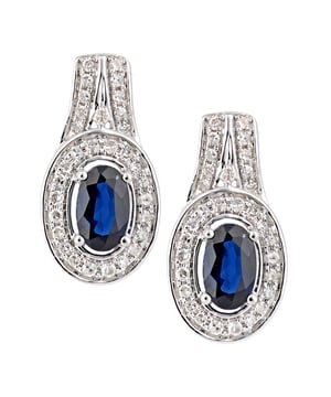 18K (750) witgoud: 2 gram; # Diamant: 0,1 ct; # Saffier: 0,71 ct