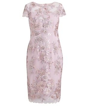 Fall in love with this stunning. This dress featuring a shift silhouette, a defined waist, and a gorgeous embroidered fabrication. This party dress boasts an illusion neckline and cap sleeves. It has a concealed zipper back closure and a scalloped hemline falls at the knees. Fitted style perfect for any occasion.