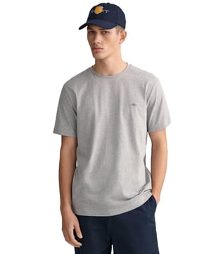 Gant Original T-Shirt is a classic crew-neck tee with logo embroidery on the chest. Feature Short Sleeves and a Crew Neckline. Crafted With 100% Cotton, these Lightweight and breathable Regular Fit T-shirts are Machine Washable.