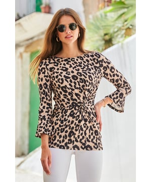 Minimum effort, maximum impact
Leopard print is always on-trend
Chic slash neckline
Flattering twist waist detail
Statement fluted sleeves
It's made for black skinny jeans  