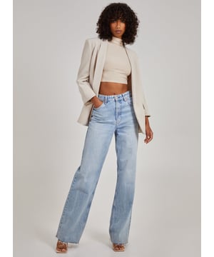 Style every outfit with ease this season with this High Neck Sleeveless Top. Look chic and effortless in the wardrobe must-have of the season.