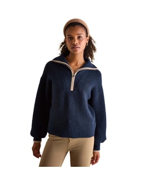 Elevate your knitwear this season with the Elmore navy jumper. Its quarter zip fastening and dropped shoulders gives it an effortless 'throw on' feel, that will keep you comfortable and stylish. The oversized ribbed collar adds interest and features contrasting colour tipping. It's finished with a ribbed hem and cuffs. Style over a slim-fitting top for a layered-up look and your favourite pair of jeans.