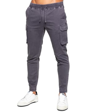 Enzo Mens Cargo Trousers. Regular Fit, Straight Leg, Enzyme Wash. 5 Pocket Design. 2 Side Pockets, 2 Cargo Pockets With Velcro Fastening. Single Back Welt Pocket. Elasticated Waistband With Adjustable Drawstring