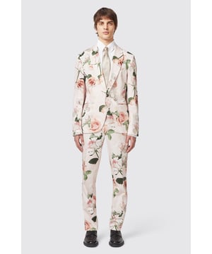 Crafted from a soft cotton with a pink floral flocking design all over, the Lincoln is your new go-to Spring/Summer tailoring favourite. The jacket is cut to a tailored skinny fit and features a shawl lapel, jet pockets and kissing buttons on the sleeves. Pair the jacket with a crisp shirt and matching suit trousers to complete this failsafe party number.