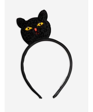 Unveiling the Girls Fluffy Cat Headband in Black, by mini_rodini, an exotic piece for your little girl's AW2024 collection. This high-end item marries luxury with comfort. Key features:‚ Chic Feline Design: Its charming cat motif elevates its style quotient, making your little star shine brighter.‚ Luxuriously Soft: Made with the finest materials ensuring ultimate plushness, to pamper your little girl's tender skin.‚ Elevate the style quotient of your girl‚ôs wardrobe with this rare piece. Let your darling make heads turn! Grab this elegant Girls Fluffy Cat Headband in Black now!