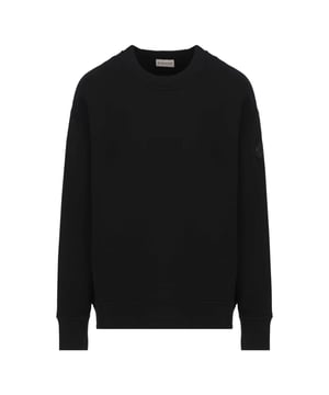 Moncler gedetailleerd logo op de achterkant van een zwart sweatshirt. Zwarte trui met Moncler-logo. Verhoog uw stijl met de Moncler Black-trui. Dit comfortabele Moncler Black-sweatshirt biedt een strakke en veelzijdige look, perfect voor elke gelegenheid. Deze truien bieden zowel stijl als functionaliteit. Upgrade vandaag nog je garderobe. Moncler-merk. Normale pasvorm, valt normaal. Geribbelde mouw- en taille-uiteinden, 100% katoen. 8G00031809KX 999