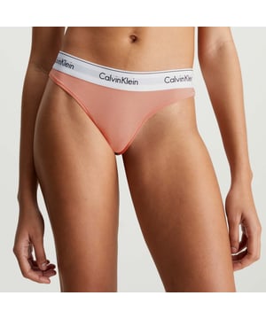 Womens Calvin Klein Modern Cotton Thong in pink.- Calvin Klein signature elastic waistband.- Medium rise waist.- 53% cotton 35% modal 12% elastane.- Ref: 0000F3786ELWG
