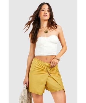 Sitting pretty at the top of our wishlist are tall shorts. Get ready for the summer season, if you're jetting off somewhere new or visiting your local seaside town as these shorts put the fire into your look. Tailored for tall girls, these shorts are designed to fit 5'7 and over, and are made for ultimate comfort. More fabric in the legs and torso offers a secure fit and ease of wear as you rock your casual summer style.Style: SkortsFabric: Linen lookLength: ShortModel's height: 178cm / 5'10"