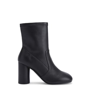 This Langley Round Ankle Boot features a black upper crafted from a soft leather. The heel is rounded matching the toe shape. Heel height: 9cm.