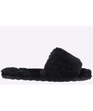 Pantuflas Hush Puppies de color negro para mujer, confeccionadas en tejido sintético y suela sintética. Incluye: pelo sintético, suela grib y plantilla con la marca.