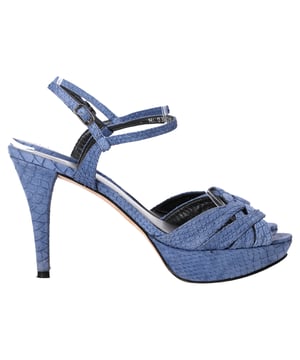 VINTAGE, RRP AS NEW
 Step into sophistication with the Stuart Weitzman Crocodile-Embossed Platform Sandal Heels in striking blue leather. These eye-catching sandals feature a luxurious crocodile-embossed finish that adds texture and depth to any outfit. The platform design not only provides added height but also ensures comfort for all-day wear. With a sleek ankle strap that offers a secure fit, these heels are perfect for elevating both casual and formal ensembles. Pair them with a chic dress or tailored trousers to make a bold statement wherever you go. Embrace modern elegance with these standout sandals from Stuart Weitzman.

Stuart Weitzman Crocodile-Embossed Platform Sandal Heels in Blue Leather

Condition: Very good
Signs of wear: Minor markings, Lightly used but very well maintained. Minor mark at soles & creasing, light scuffing at the soles and heels.
Packaging: None
Color: Blue | blue
Material: Leather | leather
Size: EU39/US8.5/UK6
Measurements: Heel height: 10; Insole length: 25
SKU: NAPPUITSH397905W