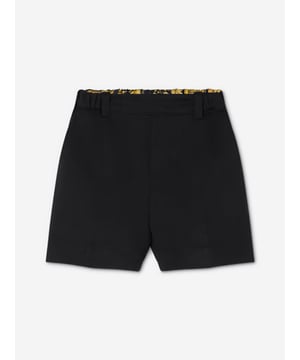 Introducing the Baby Boys Punto Milano Shorts in Black by Versace, a luxurious addition to your little one's wardrobe for AW2024. Impeccably designed in Italy, these shorts merge sophistication with comfort. Highlight features include:‚ Exquisite Italian Craftsmanship: Meticulously tailored for unparalleled quality and enduring style.‚ Chic Versatile Design: Classic black hue enhances any outfit, making it perfect for any occasion.‚ Supreme Comfort: Constructed from soft Punto Milano fabric for all-day wearability.‚ Timeless Versace Elegance: Features subtle designer details that reflect Versace's iconic luxury aesthetic.Elevate your child‚ fashion ensemble this season with these must-have Versace shorts. Shop now!