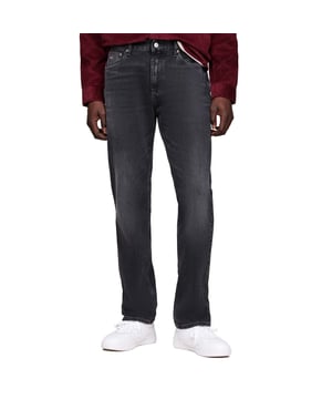 Straight jeans from Tommy Jeans. These jeans give you a lived-in look without the wait, bringing a classic straight-leg silhouette.- Regenerative and recycled cotton.- Denim cotton with stretch.- Light fading on the front.- Whiskers on the thighs.- Zip fly with button.- Tommy Jeans branding.- Tommy Jeans flag patch on the coin pocket and back pocket.- Regular fit.- Straight.- Main composition: 50% Regenerative Cotton, 29% USCTP Protocol Cotton, 20% Cotton (Recycled), 1% Elastane.- Sustainability Certification.- Global Recycled Standard RegenAgri.- Machine Washable at 40°C.- Tumble dry normal cycle, low heat.- Wash and dry inside out.- Low heat iron if necessary. Ref: DM0DM204031BZ.