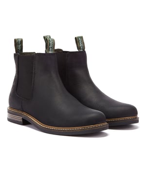 The Black Farsley Chelsea boot feature a leather upper, a double pull-loop and Barbour branded antique effect brass rivets. The rubber sole is bonded to the upper with a tough cemented construction for maximum durability.