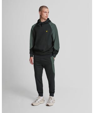 Whether youâ€™re on or off the pitch, these trackies from our Sports range will keep you warm and looking cool. They have an elasticated waistband with a drawstring fastening for a comfortable fit and feature colour-block panels at the side. - Elasticated waistband with drawstring tie \n- Side pockets \n- Colour block panels at the side\n- Composition: 22% polyamide, 3% elastane, 75% viscose, Trims: 1% elastane  99% cotton