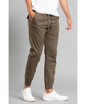 These cuffed trousers from Tokyo Laundry are a stylish addition to your wardrobe. Features ribbed elasticated waistband and cuffs, two side pockets with an inside pocket, two back pockets with buttons, and a drawstring. Made from cotton fabric to ensure comfortable wear.