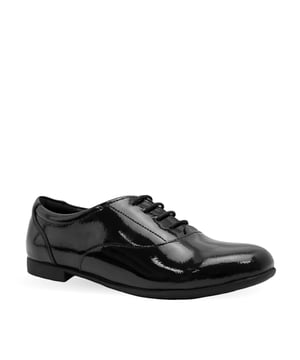 An elegant lace-up school shoe crafted in soft leather from our Angry Angels range. These classic school shoes in black leather will be popular with girls looking for a smart, contemporary style with added comfort features. The padded ankles keep busy school feet in peak comfort and the lace up fastening makes for a great fit while a lightweight, flexible sole allows for smooth movement.

Better suited for a slimmer foot and those without a high instep