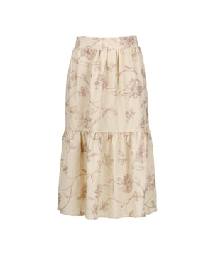 Esta falda floral de color crudo está confeccionada en un tejido de mezcla de lino y bordada con un hilo bicolor en crudo y beige. Tiene un estilo sutil en forma de A y un largo midi.