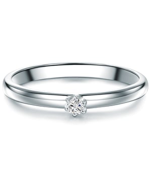 Simple and noble: This classic engagement ring from Tresor 1934 is perfect for all women who love high -quality materials and minimalist design. The narrow ring splint made of a protected 925 sterling silver stages a sparkling diamond with 0.05 carat. An elaborate brilliant cut with 57 facets ensures sensational sparkle. Apart and at the same time suitable for everyday use, the version is: inspired by the popular look of a clamping ring, the ring rail is continued almost invisibly, so that the diamond is firmly anchored. An enthusiastic "yes" with the marriage proposal is certain!
