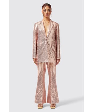 The Caladium Trouser in Rose Gold is a go-to party and event favourite. Adorned with shimmering sequins, It's guaranteed to turn heads as soon as you enter the room. Cut to a slim fit with a flared leg, it's the perfect pair of trousers with a rose gold twist. Pair it with the matching Caladium Jacket in Rose Gold to complete the full look.