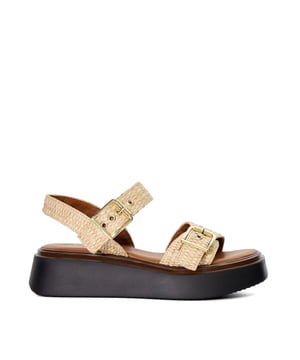 Refresh warm-weather ensembles with minimal sandal Loells. Crafted from the finest material, the upper of this square-toed silhouette culminates in two wide straps, each enhanced with large buckles. Set on a flatform sole that rises to a wearable 4cm height, this versatile sandal pairs equally well with everything from denim to sundresses and is finished with a lined footbed that promises all-day comfort.